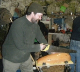 Stephen begins the nerve-wracking work of sawing the groove for the keel. Photo: Marianne Green